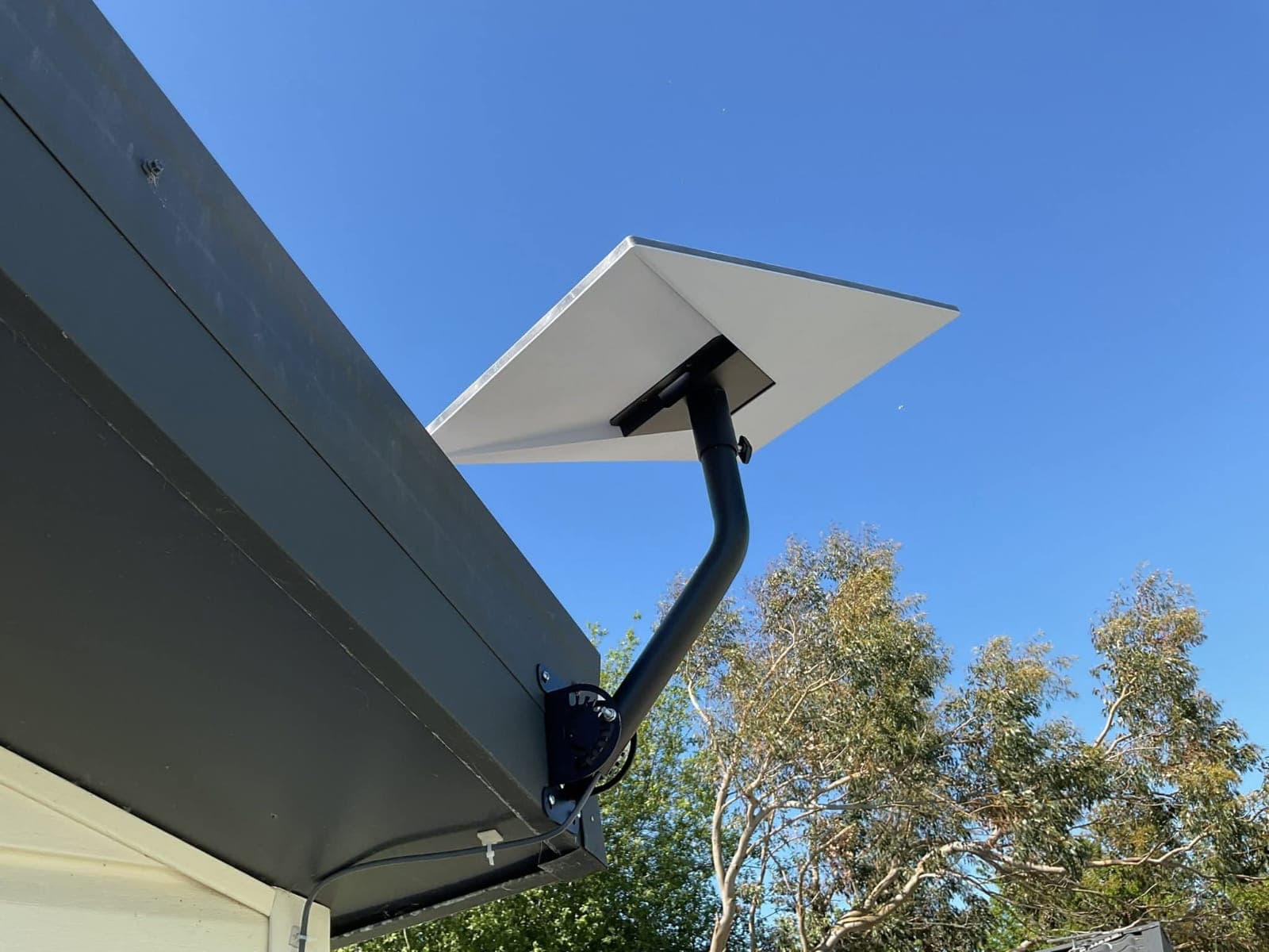 Starlink dish mounted cleanly above a roofline