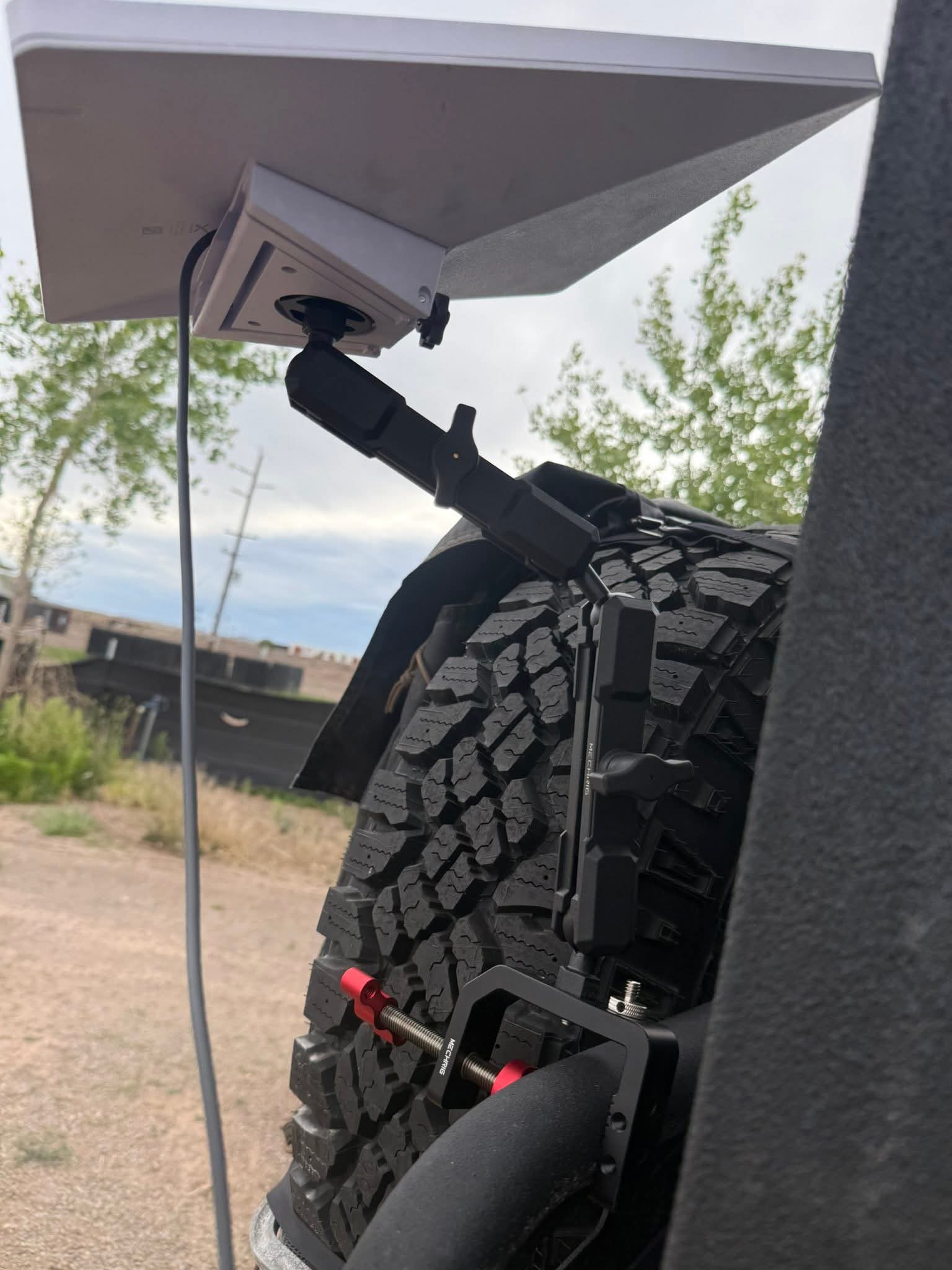 Starlink Mini mounted on a vehicle spare tyre